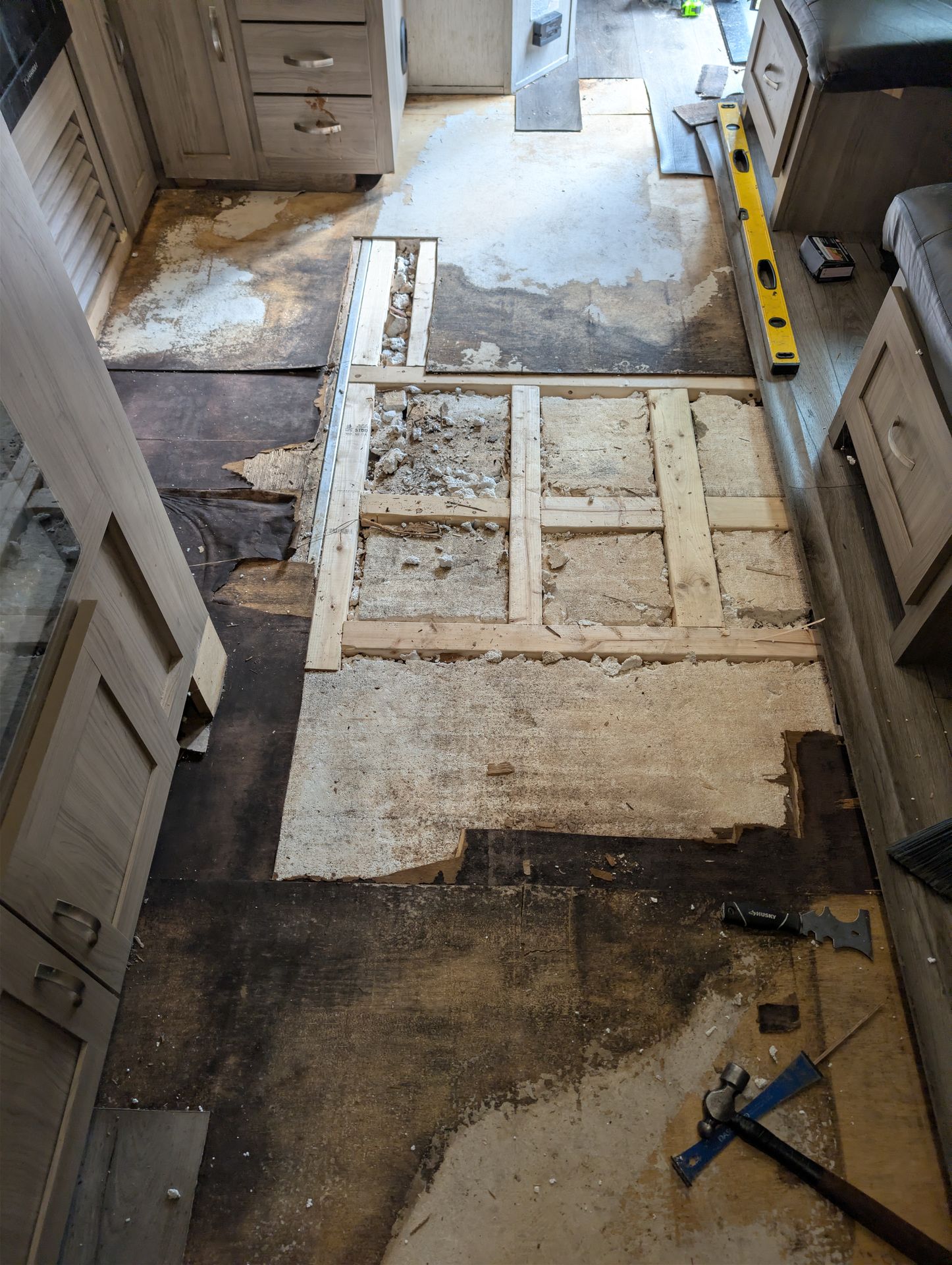 New subfloor installed in an RV during a rotted floor repair