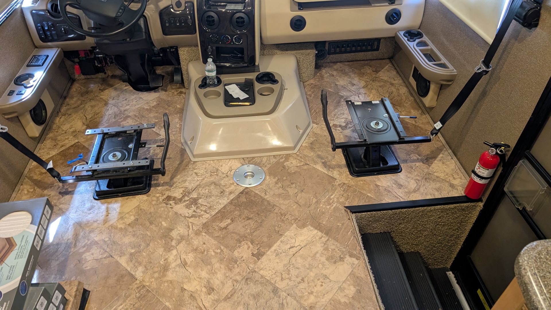 Luxury vinyl plank flooring being installed inside an RV