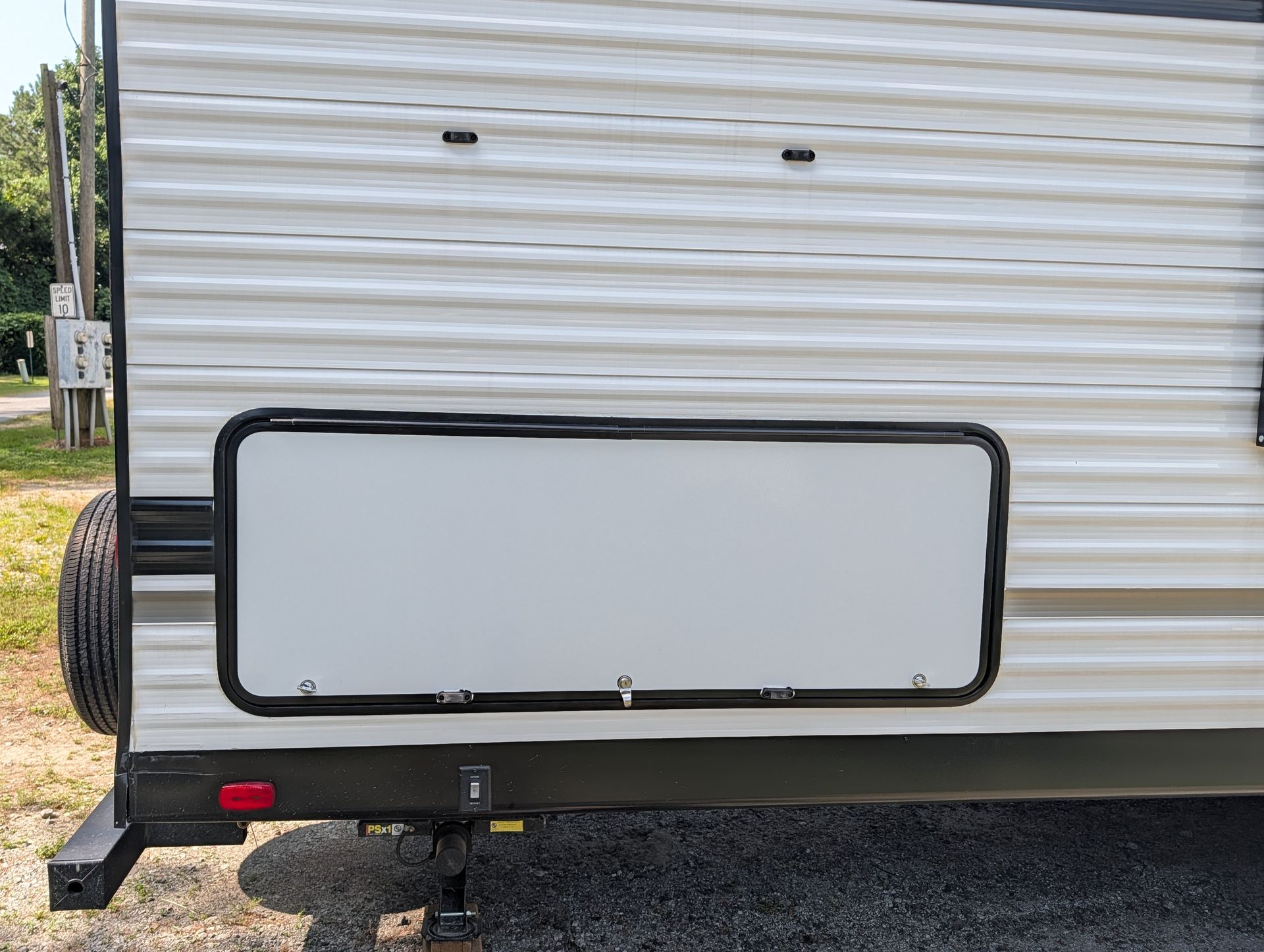 RV side before a decal install